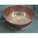 ANTIQUE WEST COUNTRY METALWARE, an unusual large circular copper strainer with pricked ownership "FB