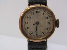 VINTAGE GOLD CASED WRIST WATCH, on leather strap, 17.5grms overall