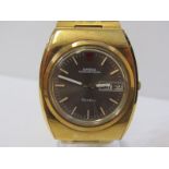 OMEGA MEGAQUARTZ 32 KHZ ELECTRONIC MOVEMENT WRIST WATCH, day date aperture, gold plated case and