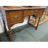 EARLY 18TH CENTURY DESIGN, CROSS BANDED WALNUT KNEEHOLE DESK, barley twist support and stretchered