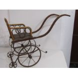 ANTIQUE CHILD'S CART, bentwood and metal spring frame, with original paintwork, 64cm length