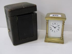 MINIATURE BRASS CASE DOMED TOP CARRIAGE CLOCK in travel case, 8cm height