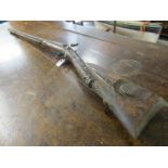ANTIQUE WEAPONS, 19th Century muzzle loading twin barrel percussion shotgun, shell and mask carved