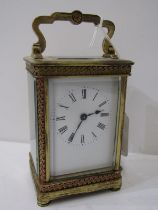 CARRIAGE CLOCK WITH DECORATIVE FOLIATE BORDER and bevel glass windows, 12cm height