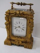 ORNATE GILT METAL CASED CARRIAGE CLOCK, classical column support and bevel glass window, 16cm height