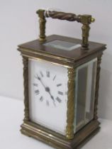CARRIAGE CLOCK, brass writhen column support carriage clock, plain enamel face, 13cm height