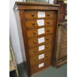 WELLINGTON CHEST, oak pedestal chest of 7 drawers with wooden knop handles, 128cm height 64cm width