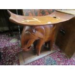 ASHANTI CARVED STOOL with elephant support base, 63cm width