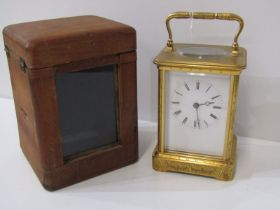 HENRY MARC, bell strike carriage clock with attractive engraved brass casing and plain enamel