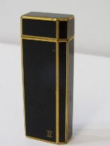 CARTIER, Cartier black and gilt cigarette lighter