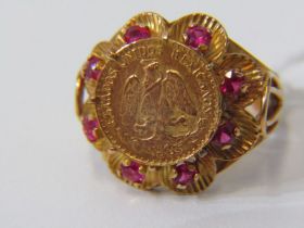 COIN STYLE RING, 9ct yellow gold ring, set a coin style plaque with rubies to the outer, size K. 6.7