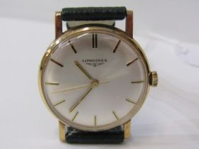 LONGINES, a Gent's Longines gold cased wrist watch on green leather strap with presentation