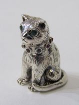 SILVER CAT FIGURE, sterling silver seated cat figure with green glass eyes