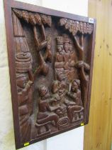 ETHNIC CARVING, relief carved panel "Village Life" 63cm x 45cm