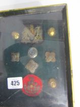 MILITARIA, cased display of buttons and cloth lapel badges, together with a matchmakers box of