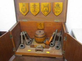 SMOKERS CABINET, an interesting vintage smokers cabinet decorated with military plaques & pipes,