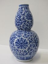 ORIENTAL CERAMICS, Chinese underglaze blue double gourd foliate and blossom decorated 30cm vase