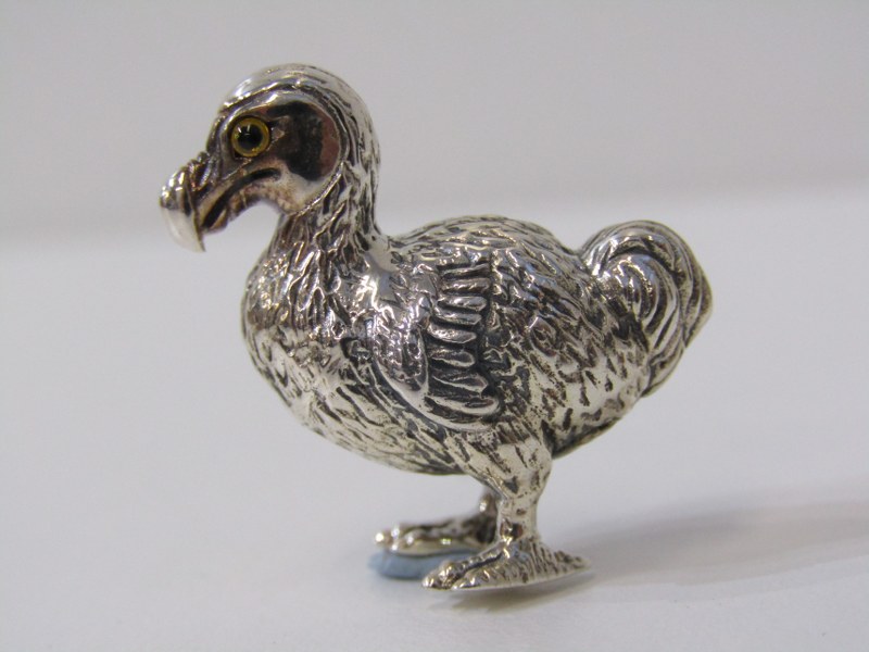 NOVELTY SILVER DODO, sterling silver figure of a Dodo with glass eyes