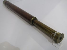 MARITIME, leather sheathed early 20th Century brass single draw telescope by Elliott Bros.