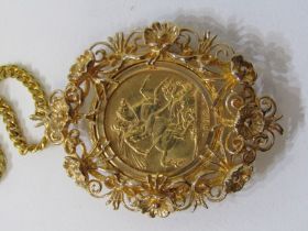 SOVEREIGN PENDANT ON GOLD CHAIN, 1919 George V gold sovereign mounted in a 9ct gold fancy floral