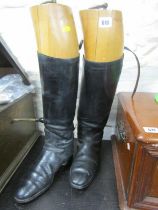 EQUESTRIAN, pair of leather riding boots with wooden shoe tree
