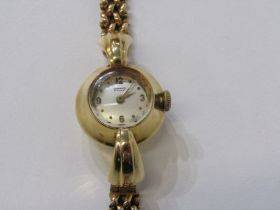 LADY'S GOLD CASED WRISTWATCH, Lady's Tissot gold cased wristwatch on a 9ct gold strap, 20.8 grams