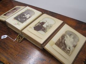 VICTORIAN LEATHER CASED PHOTO ALBUM, with unusual twin section with full contents, 33cm width