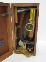 MICROSCOPE, vintage original wooden case student microscope in lacquered brass and black enamel,