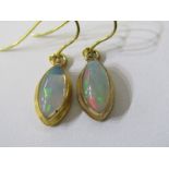 OPAL EARRINGS, pair of 9ct yellow gold and wire framed opal earrings