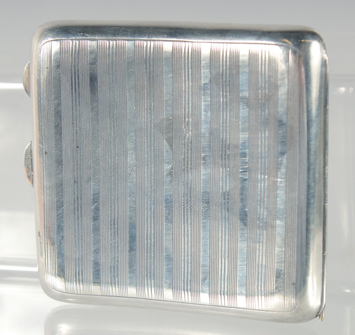A GEORGE V ENGINE TURNED SILVER CIGARETTE CASE, with an oval enamel of a nude. Birmingham, 1919. - Image 4 of 4