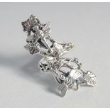A SILVER AND NATURALISTIC DRAGONFLY RING.