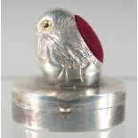 A SILVER CHICK OVAL PIN CUSHION AND BOX.