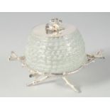 A SILVER PLATED HONEY POT FORMED AS A BEEHIVE.