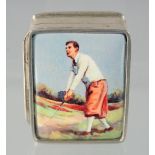 A SILVER AND ENAMEL GOLF PILL BOX, 3 cm.