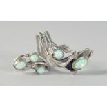 A SILVER REAL OPAL NATURALISTIC SET RING.