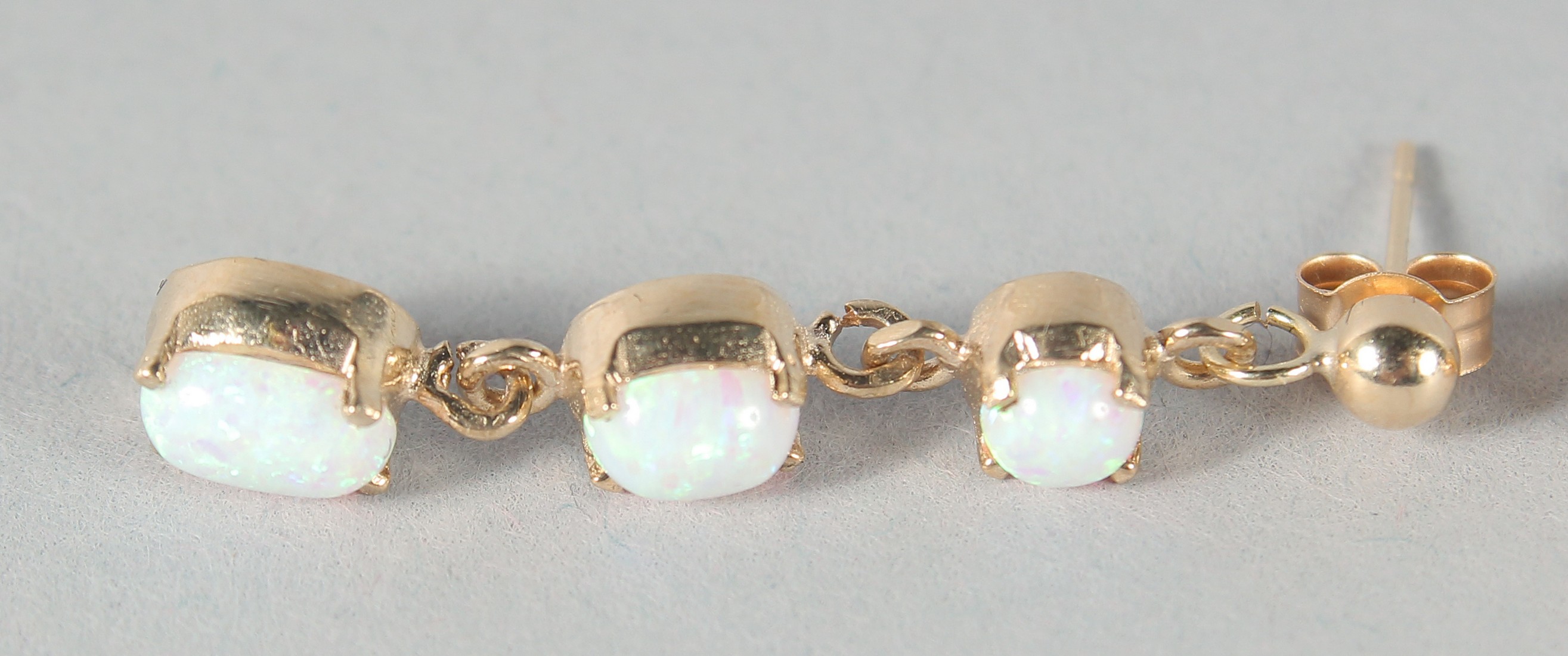A PAIR OF 9ct. GOLD THREE OPAL DROP EARRINGS. - Image 2 of 3