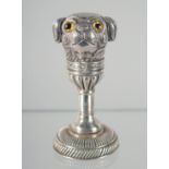 A SILVER PUG DOG DESK SEAL, 5 cm long.