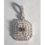 A VERY GOOD 9ct. GOLD, DIAMOND SET, DECO STYLE PENDANT.