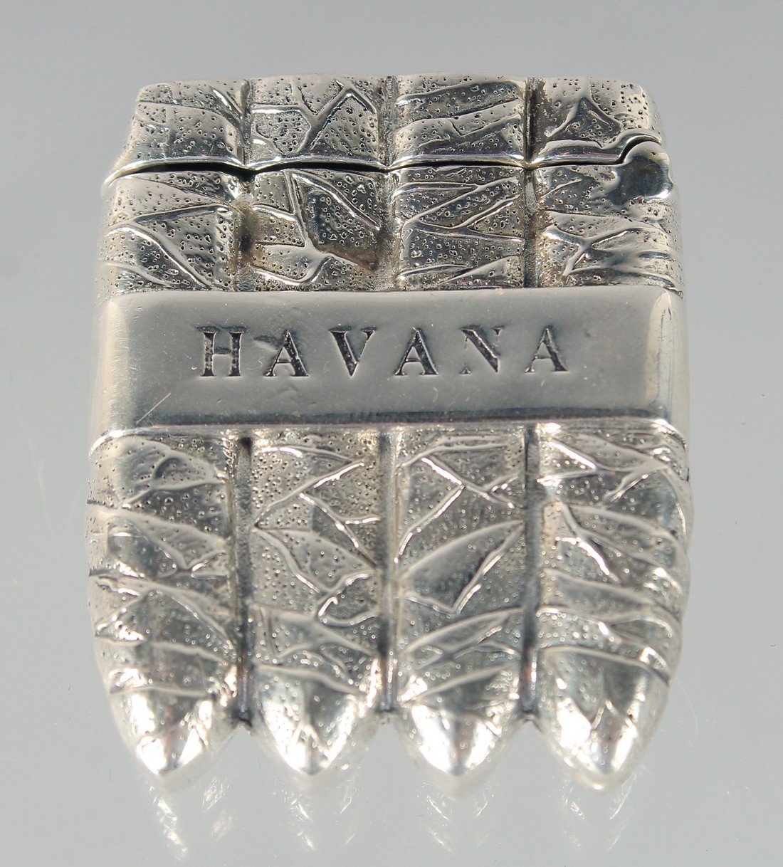 A SILVER HAVANA CIGAR VESTA CASE.