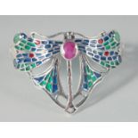 A SILVER RUBY AND EMERALD PLIQUE-A-JOUR ENAMEL DRAGONFLY BANGLE.