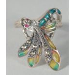 A SILVER AND MARCASITE PLIQUE-A-JOUR DRAGONFLY RING.