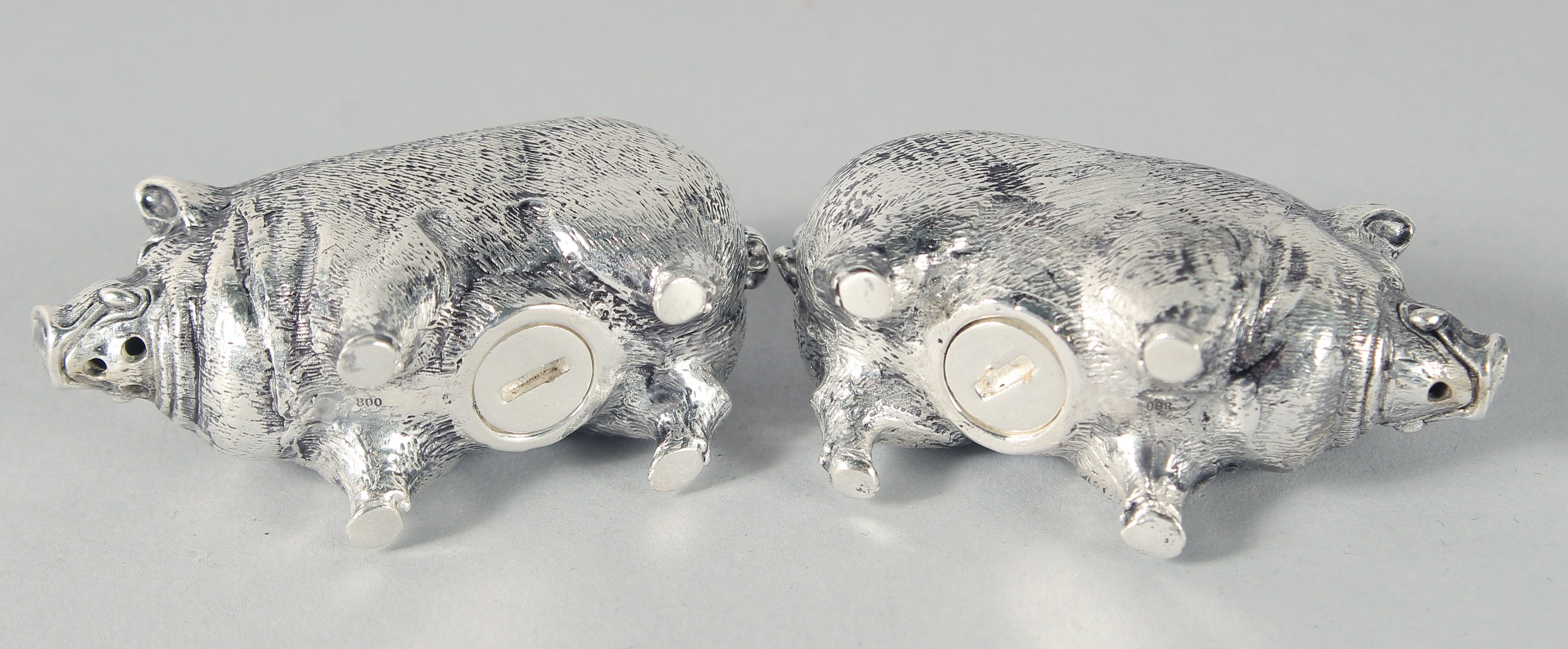 A PAIR OF SILVER PLATED PIG SALT AND PEPPERS. - Image 2 of 3