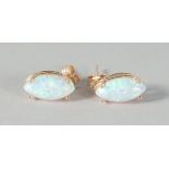 A PAIR OF 9ct. GOLD MARQUISE OPAL EAR STUDS.