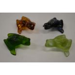 Four Lalique opaque glass frogs.