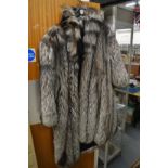 A very good ladies full length fur coat.