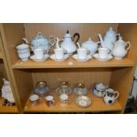A quantity of 19th century and later gilt decorated cups, saucers etc.