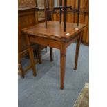 A small oak draw leaf table.