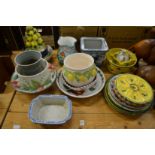 Various pottery jardinieres, decorative plates etc.