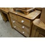 A small Victorian pine chest of drawers.