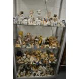 A very large collection of porcelain and other pug dog ornaments.